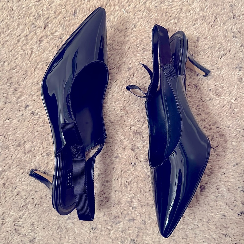 Worn once. Slingback 2” heel. Navy in color Patent leather.